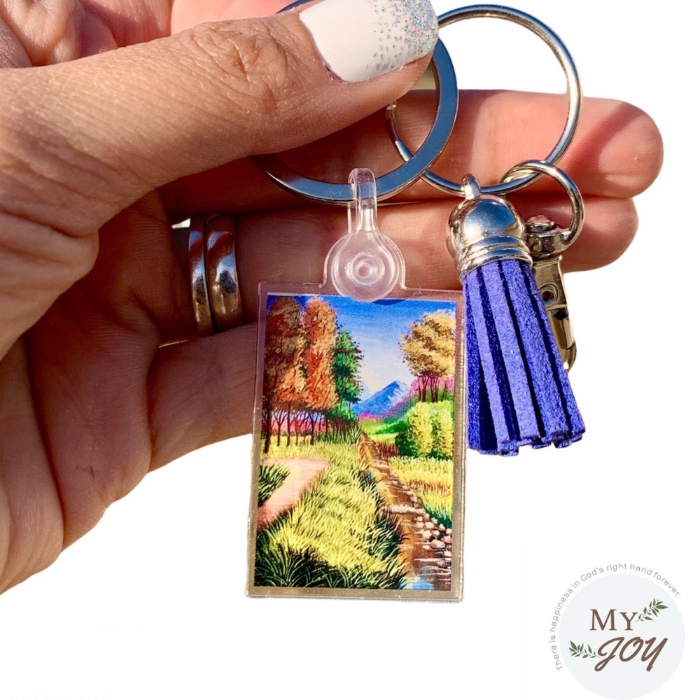 Artwork Keychain, comes with a swivel hook with key ring and tassel